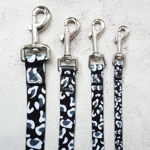 4 sizes of black and white leopard print dog leads with silver lobster clasp